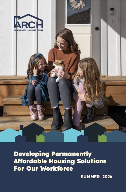 A woman sits on wooden steps holding a cat, smiling at two young girls beside her. The ARCH Community Housing Trust logo and "ARCH 2025 Annual Report" appear above text: Developing Permanently Affordable Housing Solutions For Our Workforce, Summer 2026.